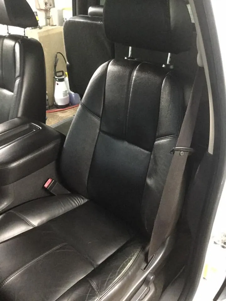 Black pickup-truck interior - deep-clean detail (front leather seat) - after