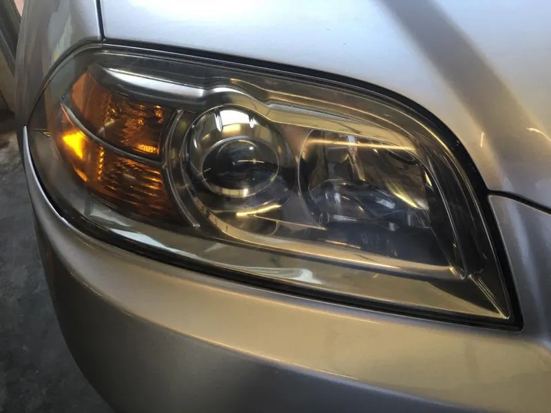 Gold car - headlight restoration - after