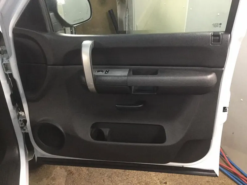Gray pickup-truck interior - deep-clean detail (driver door panel) - after
